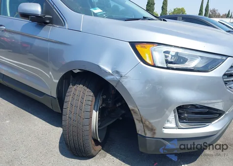 2021 Ford Edge Sel z USA, uszkodzony, nr VIN 2FMPK4J90MBA40348